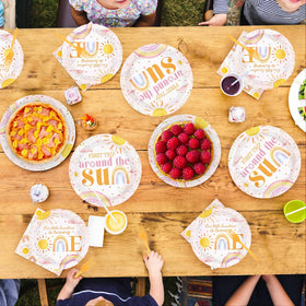 Grencian one-year party decor; cohesive theme complements First Trip Around The Sun.