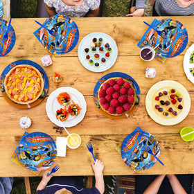 Grencian party table setup with race car dishes creates a cohesive look