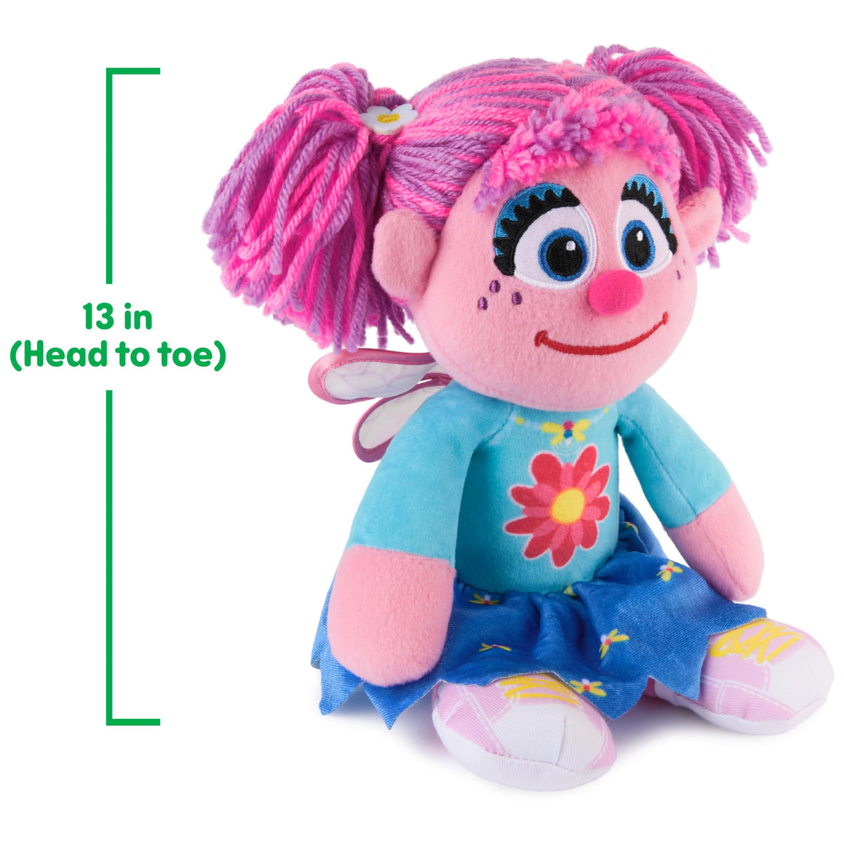 Blue flower-pattern outfit detail adds Sesame Street charm.
