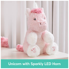 GUND Alora unicorn singing action invites parents to share learning moments.