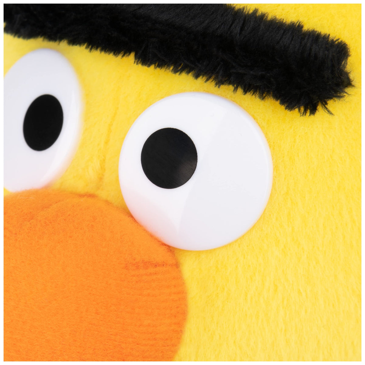 GUND Bert soft yellow plush feels buttery to the touch for comforting hugs.