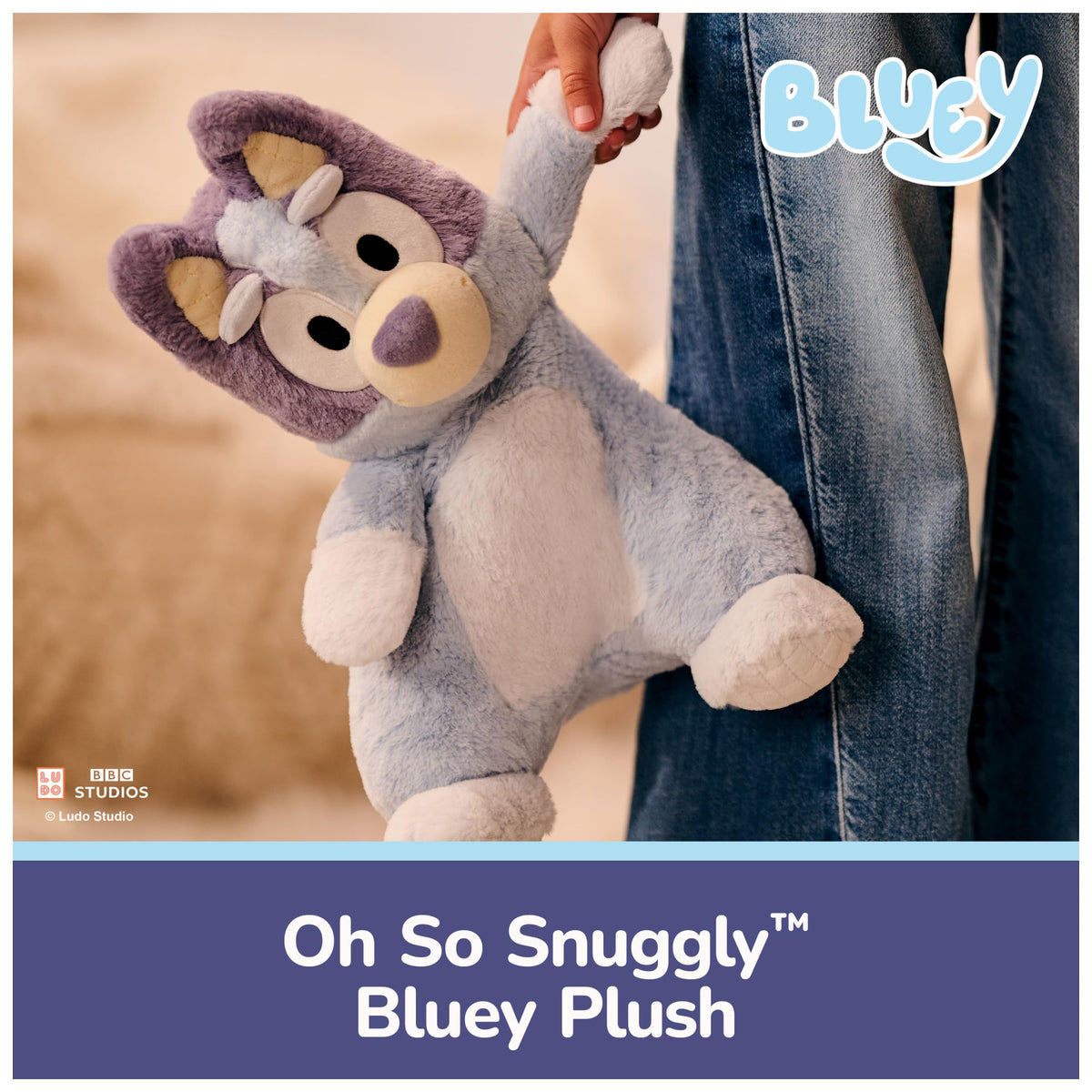 GUND Bluey plush face with bright eyes for joyful pretend play.