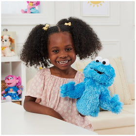 Close-up of Cookie Monster's googly eyes on the GUND plush hand puppet.
