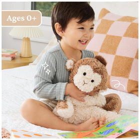GUND Cozys Monkey under-stuffed body enhances posability for hugs.