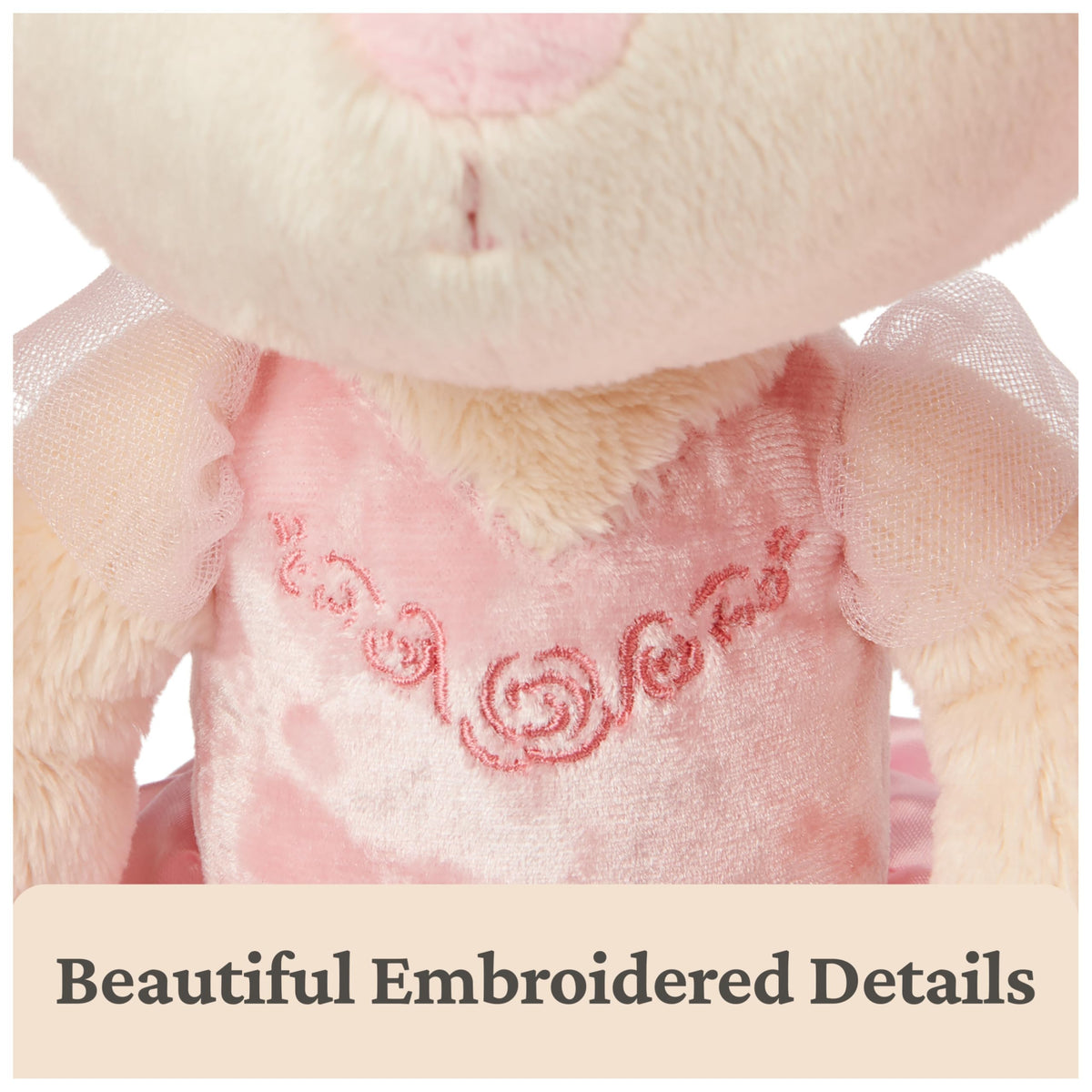 GUND Curtsy Bunny pink satin tutu highlights graceful styling for imaginative dance.