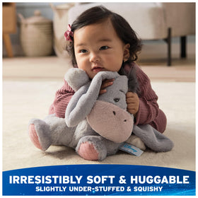 Tail with pink bow detail sparks imaginative stories and recognizable cues.