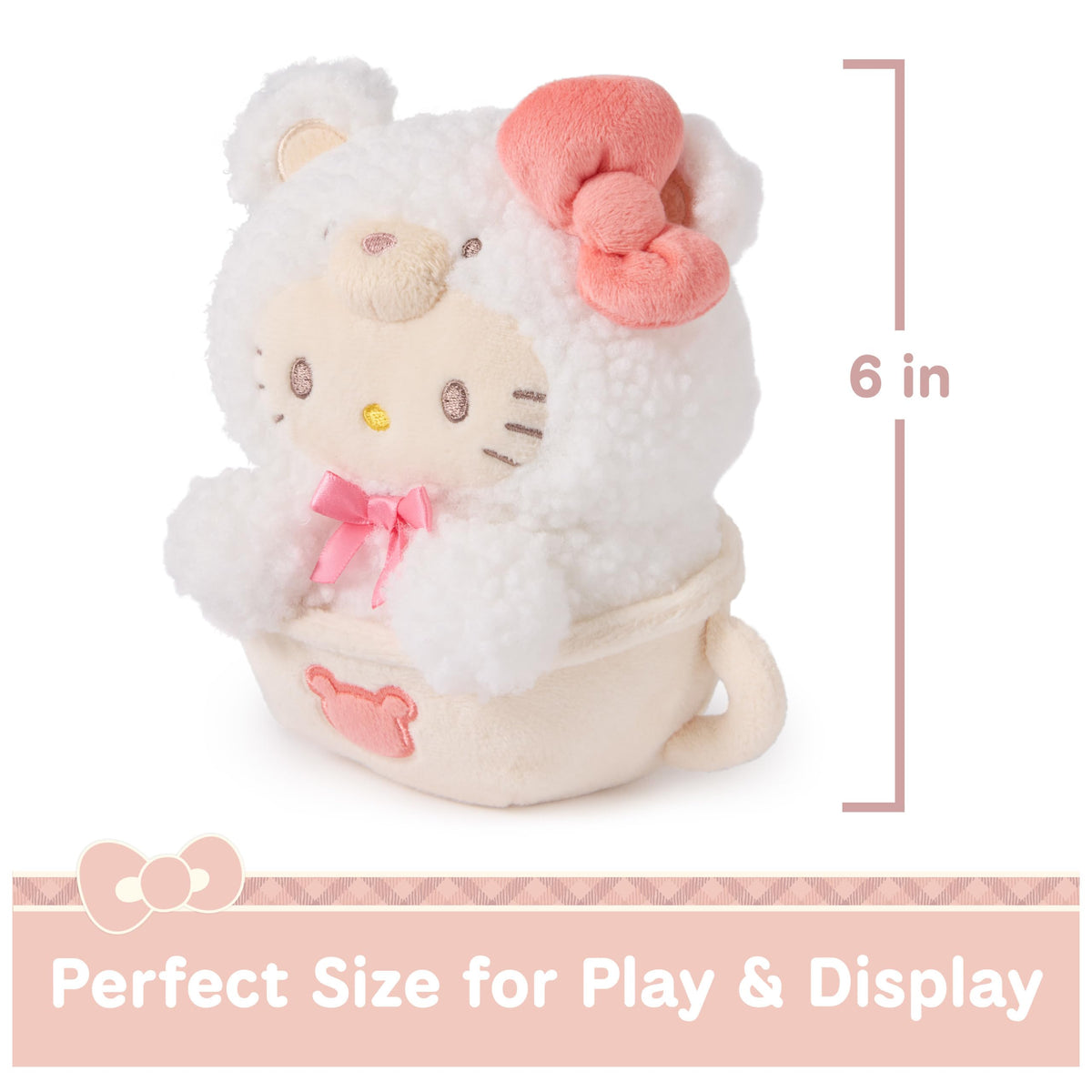 Pink bows on Hello Kitty's ears add kawaii charm.