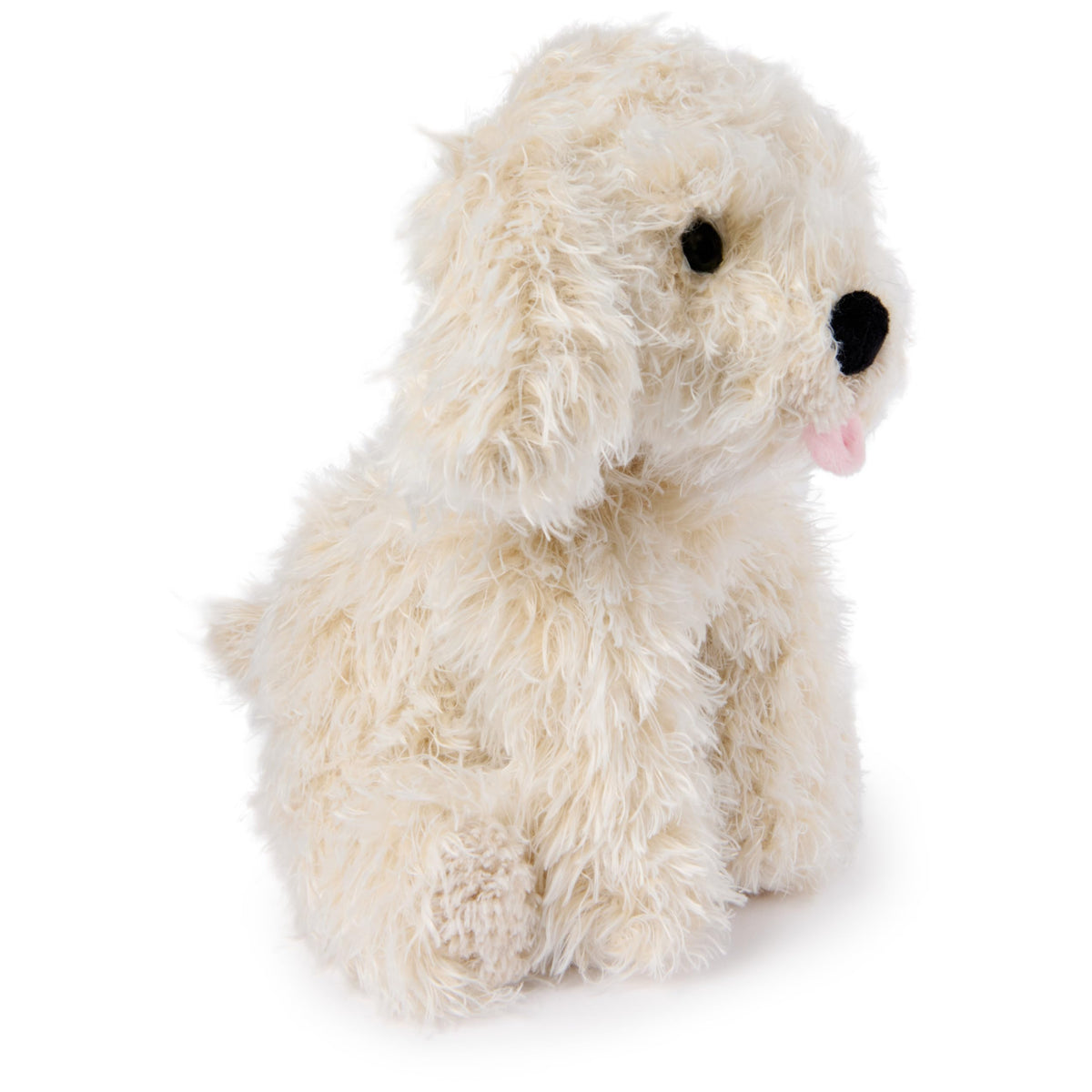 GUND Karina Labradoodle sits upright, a cuddly companion ready for play.