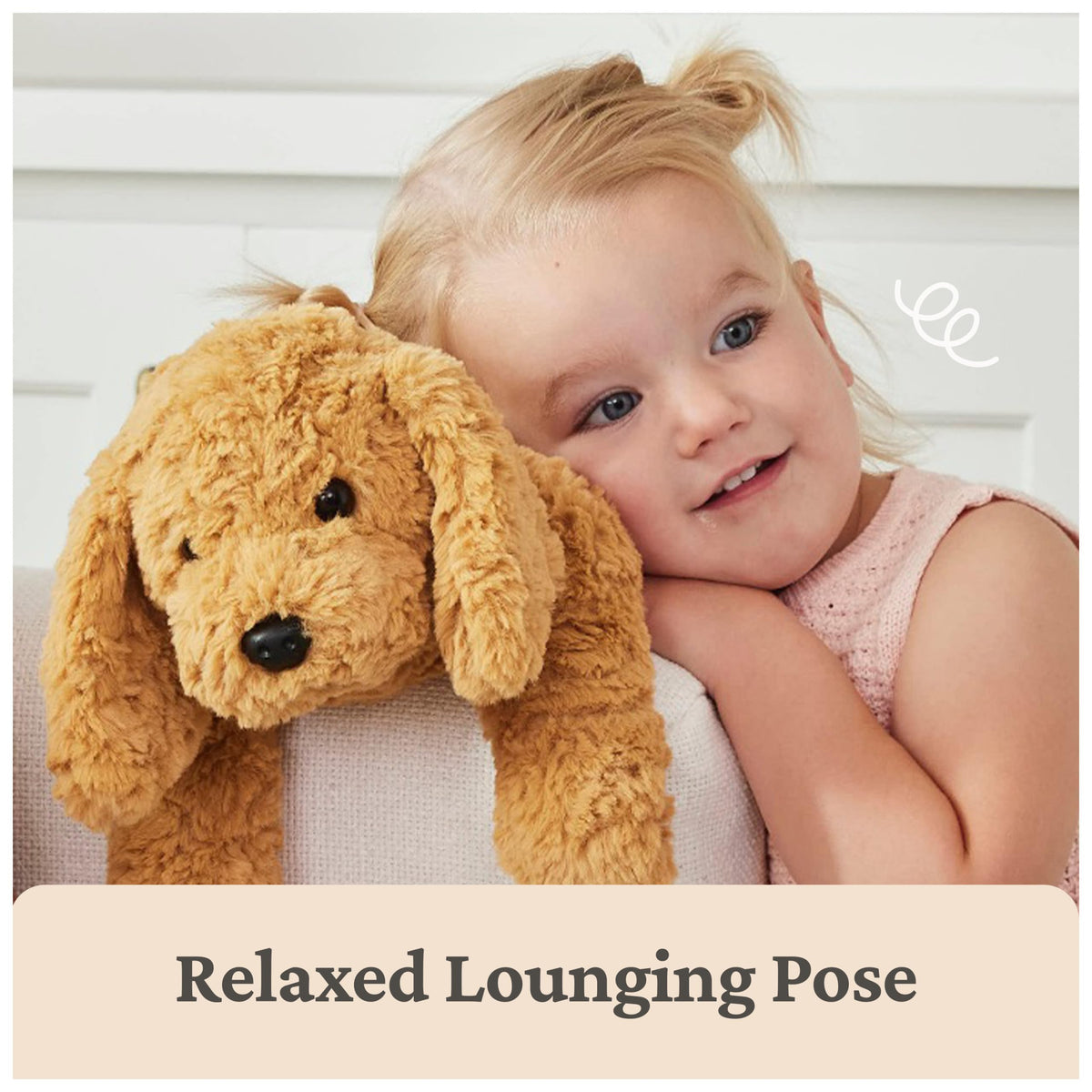 Muttsy sits lounging, a portable snuggle companion for travels