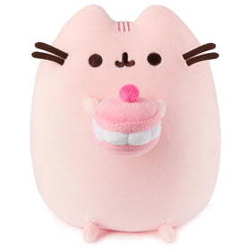 GUND Pusheen Cherry Macaron Squisheen plush holding a macaron for cozy play