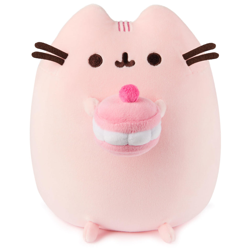 GUND Pusheen Cherry Macaron Squisheen plush holding a macaron for cozy play