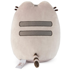 GUND Pusheen on a desk as kawaii decor and gift idea.