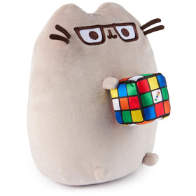 GUND Pusheen wearing glasses with a soft satin cube for playful flair.