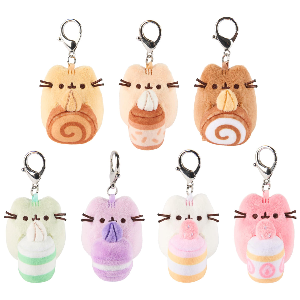 GUND Pusheen patisserie surprise plush holding a dessert for cute desk decor.