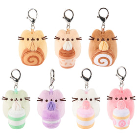 GUND Pusheen patisserie surprise plush holding a dessert for cute desk decor.