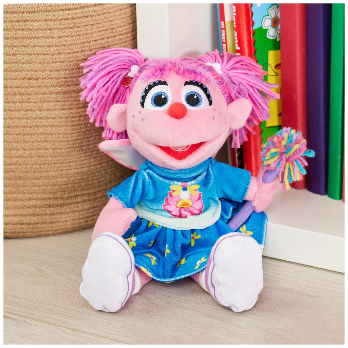 Abby Cadabby plush in flowery blue dress, soft to touch for cozy snuggle moments.