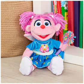 Abby Cadabby plush in flowery blue dress, soft to touch for cozy snuggle moments.