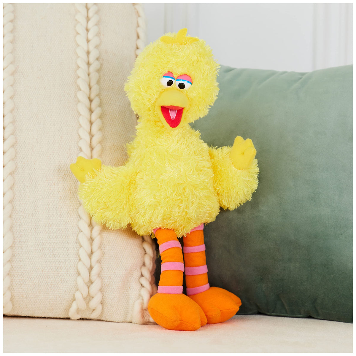 GUND Big Bird plush showing orange-pink striped legs for playful detail