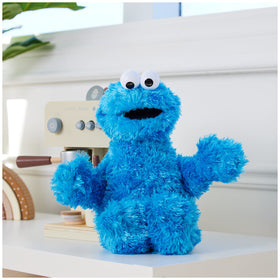 GUND Cookie Monster plush features bright blue fur for colorful play and display.