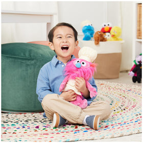 GUND Sesame Street Gonger plush hugging diagonal, perfect cuddle partner for bedtime stories
