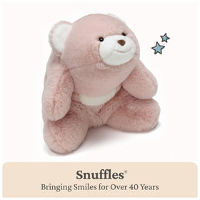 Snuffles curved crescent shape creating eye-contact during cuddles.
