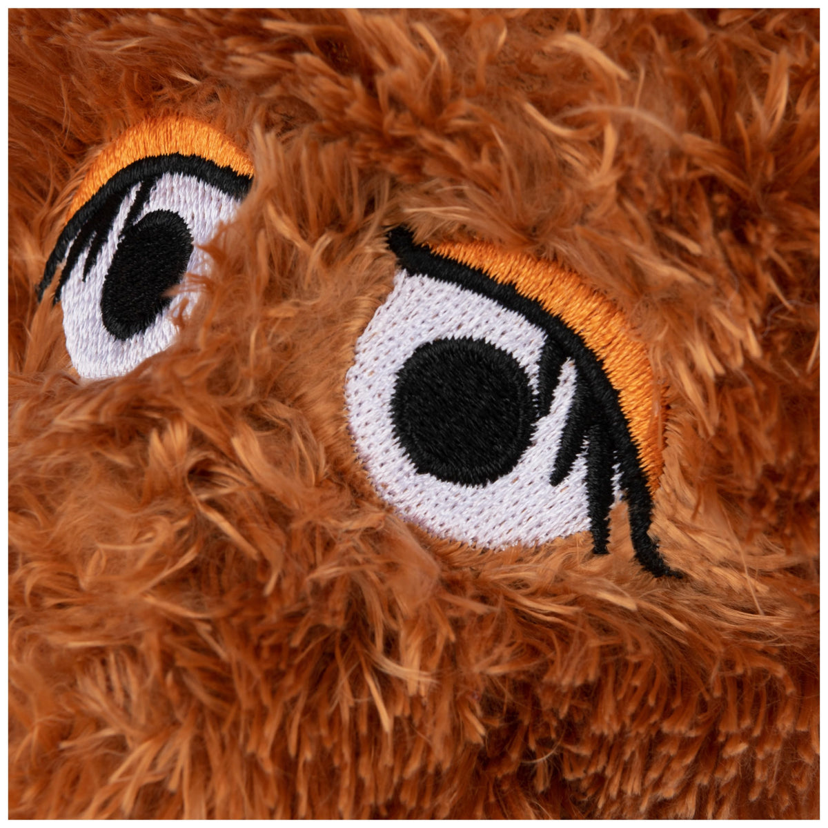 GUND Snuffleupagus plush side view showcases soft silhouette for room decor.