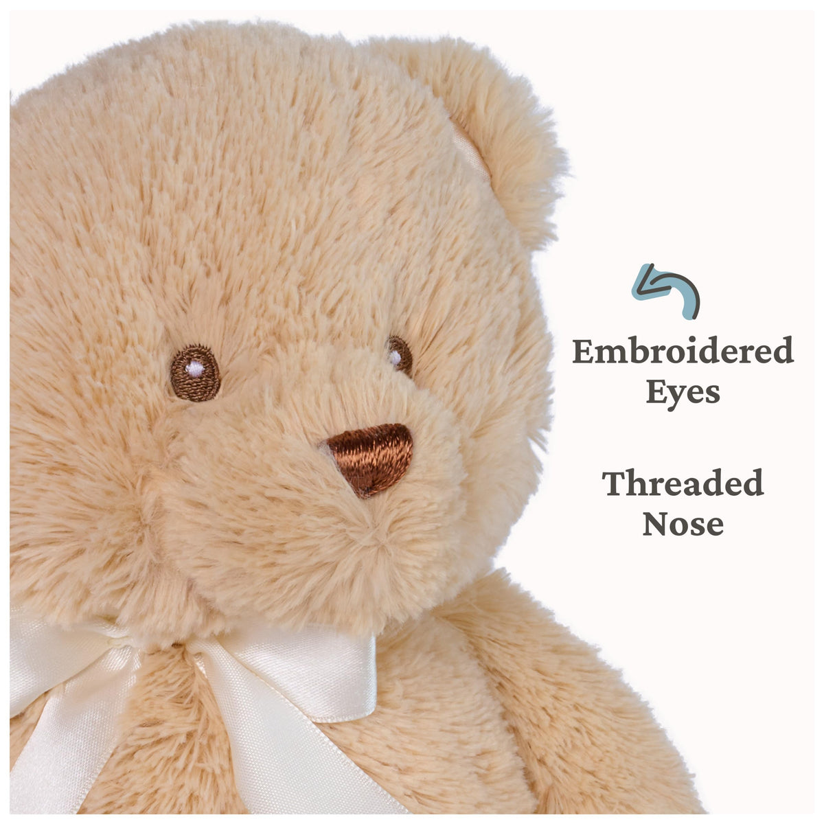 GUND plush features satin ears and bow for a luxurious nursery accent.