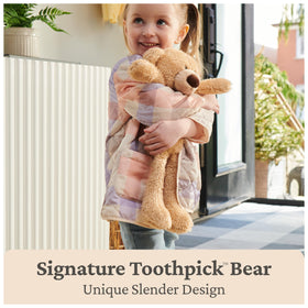 GUND Wavy Bear's floppy limbs invite interactive play and cuddling