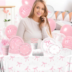 Gupesxu pink bow utensils: disposable forks and straws for quick party setup.