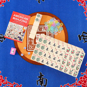 GUSTARIA 166-tile ivory-back set arranged to highlight tile variety.