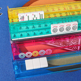 GUSTARIA trays and lids keep tiles organized during games.