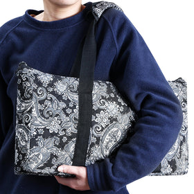GUSTARIA black carrying case offers stylish, tear resistant transport.