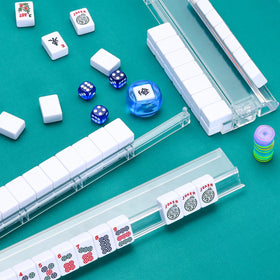 GUSTARIA four-pack racks offer built-in pushers for clutter-free game setup.