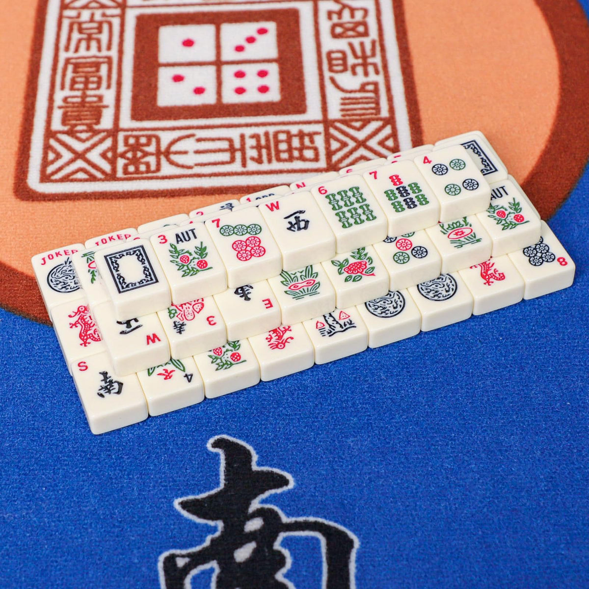 GUSTARIA tiles show English letters and numerals for quick recognition.