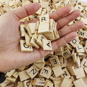 GXXMEI spelling game tiles closeup shows clear printed letters for easy reading.
