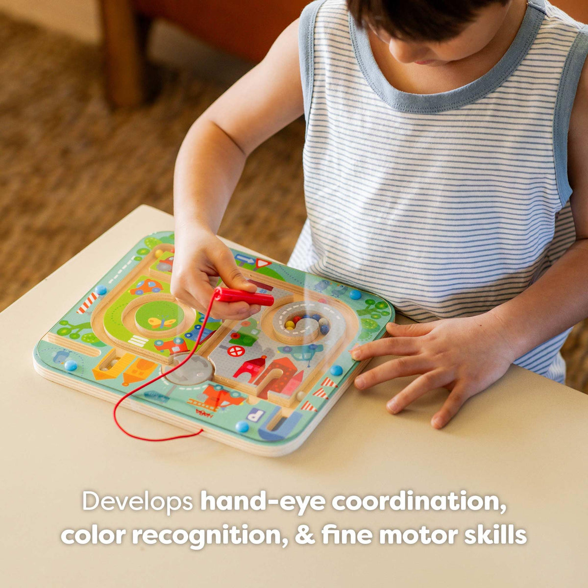 HABA Busy Board closeup of magnetic puzzle pieces for fine motor practice.