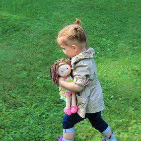 HABA Coco doll headband detail adds cute finishing touch for pretend outfits.