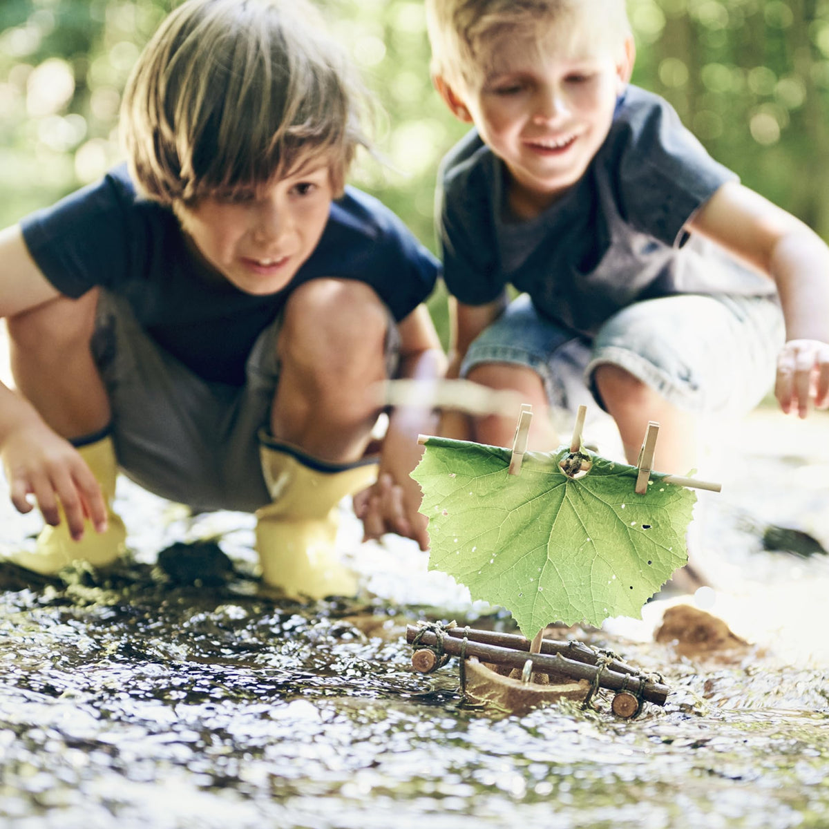HABA DIY Cork Boat kid hands explore buoyancy and assembly with natural materials.