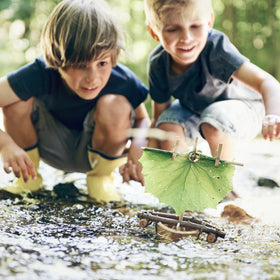 HABA DIY Cork Boat kid hands explore buoyancy and assembly with natural materials.