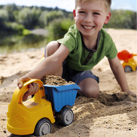 HABA durable plastic dump truck built to withstand busy beach and yard play.