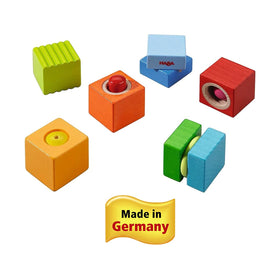 HABA blocks stacked with a parent guiding discovery