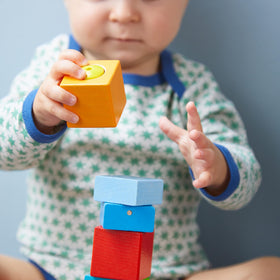 HABA Montessori-inspired play with colorful stacked cubes