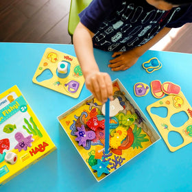 HABA Here Fishy Fishy complete toy set with simple rules for toddlers.