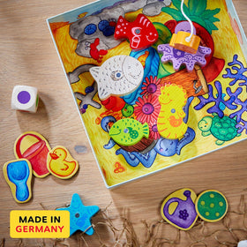 HABA Here Fishy Fishy wooden fish pieces for color matching fun.