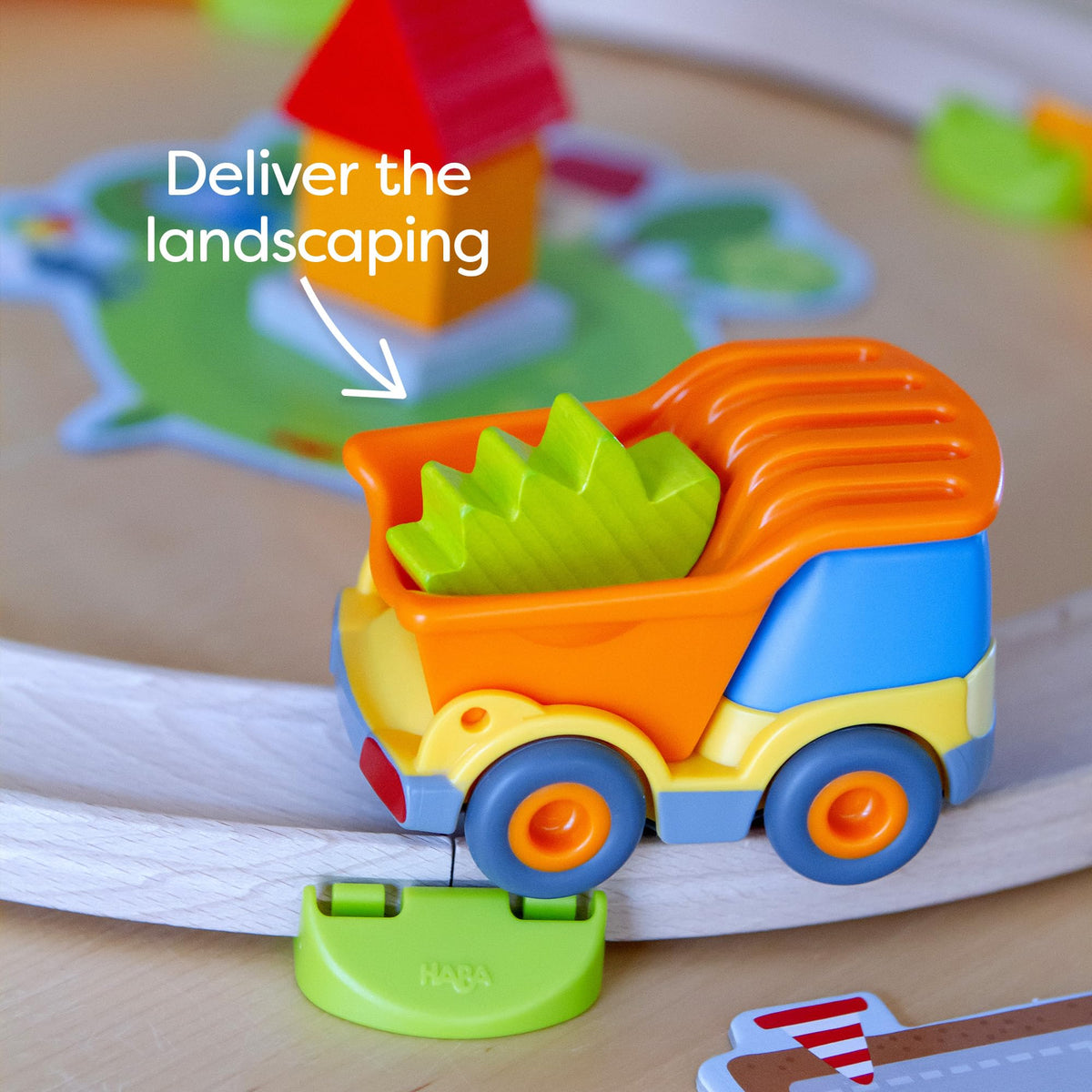 HABA My Very First Games Building Site: card chips guide turn-taking in a shared build.