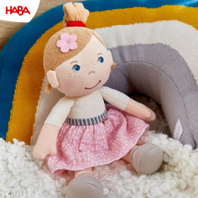HABA Snug Up Lauren pink skirt outfit for imaginative play.
