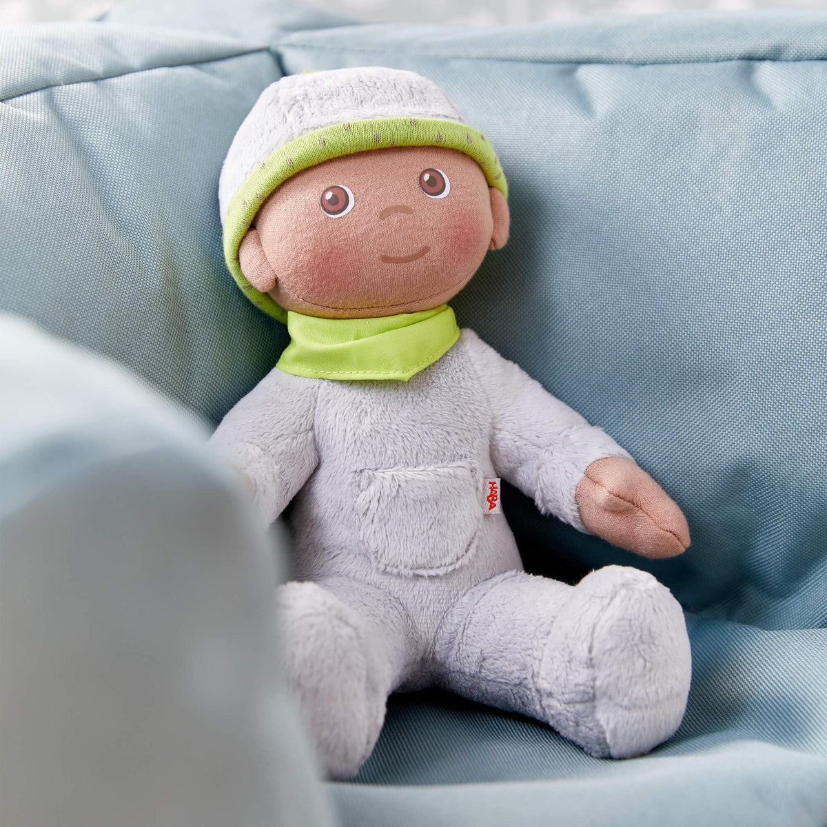 HABA Snug Up Ollie close-up face with sewn-on features