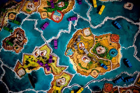 Hachette Cyclades auction coins and bidding tokens in use