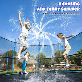 Children play under HaiSun sprinkler cooling the trampoline surface