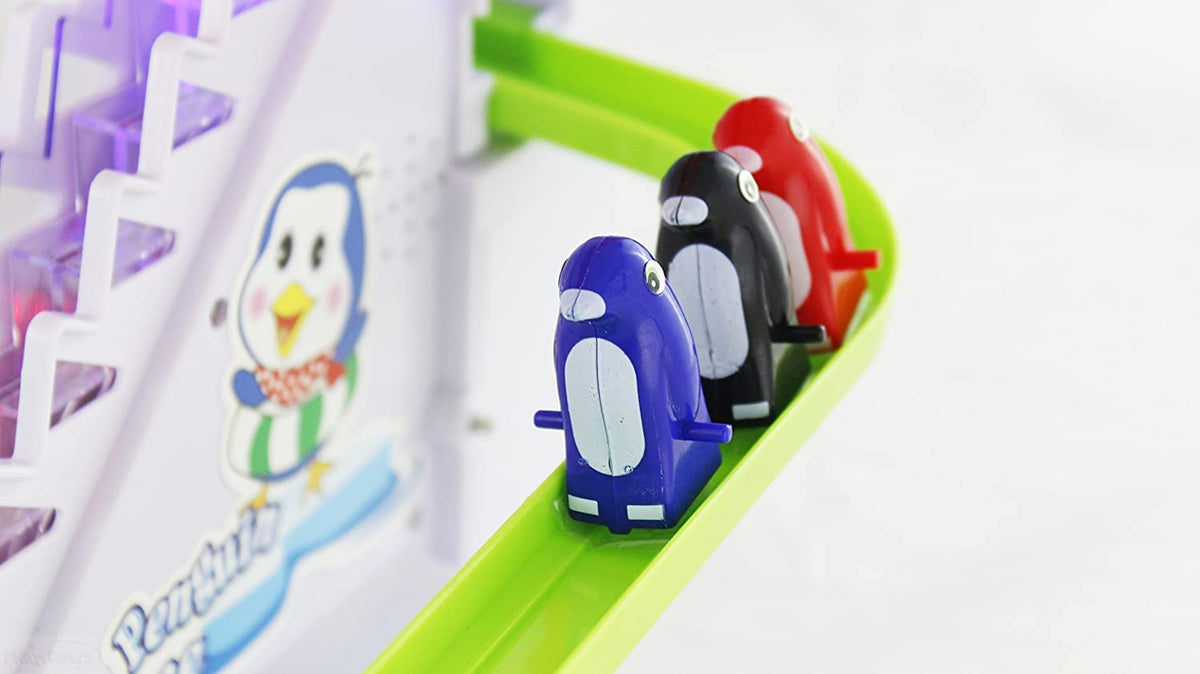 Haktoys penguin set includes board and three penguins for instant play
